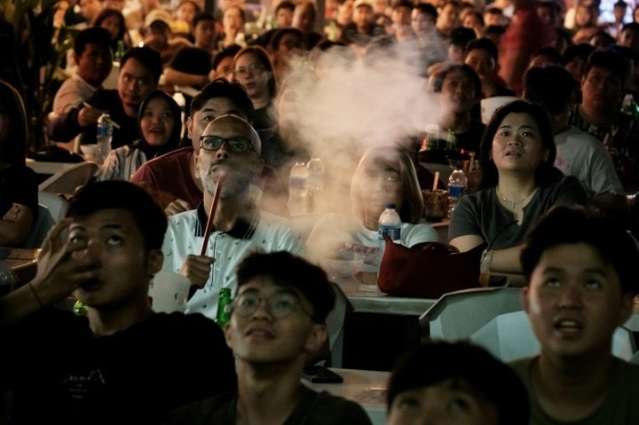 Indonesians have been gripped by their team's games at the Asian Cup in Qatar. AFP