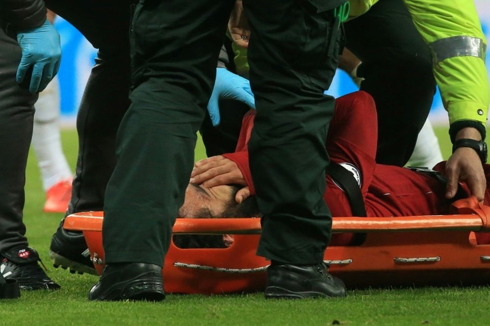 Liverpool face nervous wait on gravity of Salah head knock. AFP