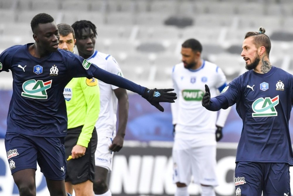 Dario Benedetto (R) scored in Marseille's win at Auxerre. AFP