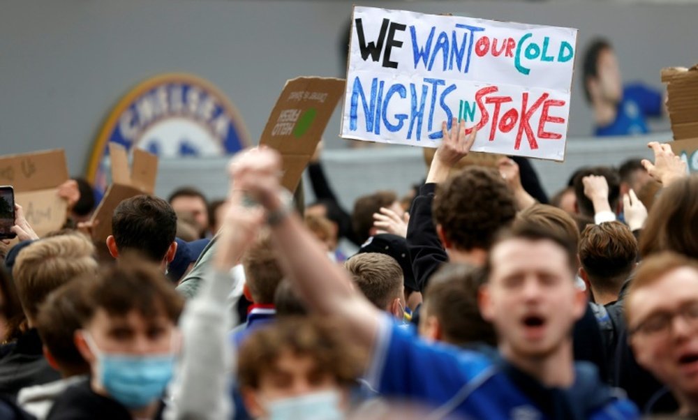 Fans gathered outside Stamford Bridge in protest. AFP