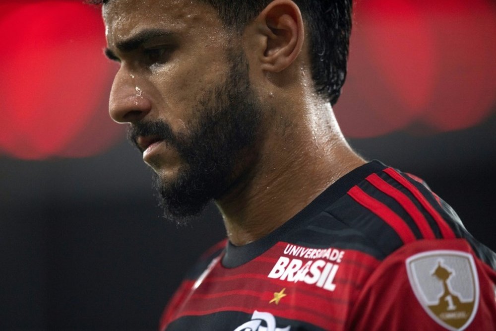 Henrique Dourado has been banned for 12 months after barging into the referee. AFP
