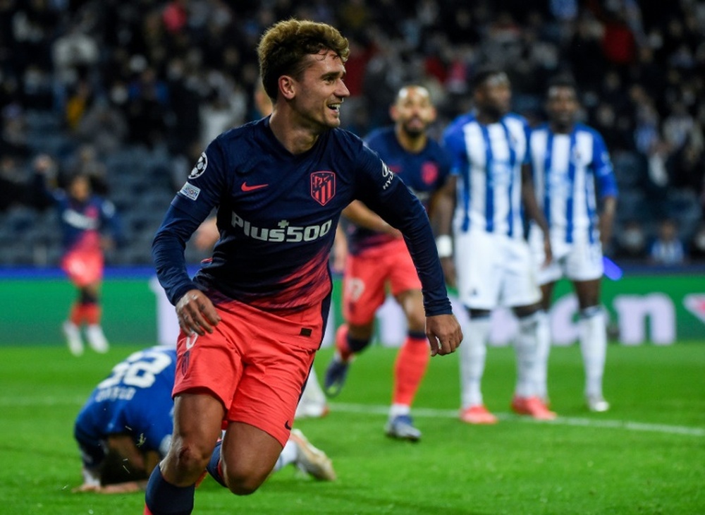 Atletico grab last 16 Champions League spot in ill tempered clash