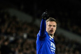 Jamie Vardy scored twice as Leicester celebrated their promotion to the Premier League in style on Monday with a 3-0 win at Preston that secured the Championship title.