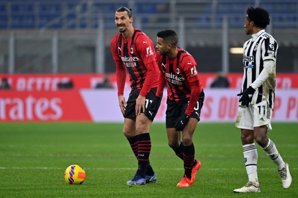 Zlatan Ibrahimovic (L) is unavailable for AC Milan's game with Inter on Saturday. AFP