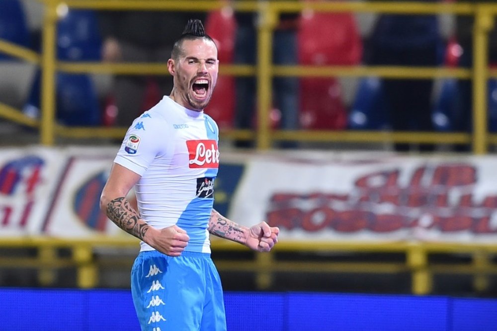 Napolis Marek Hamsik celebrates after scoring against Bologna during their Serie A match. AFP