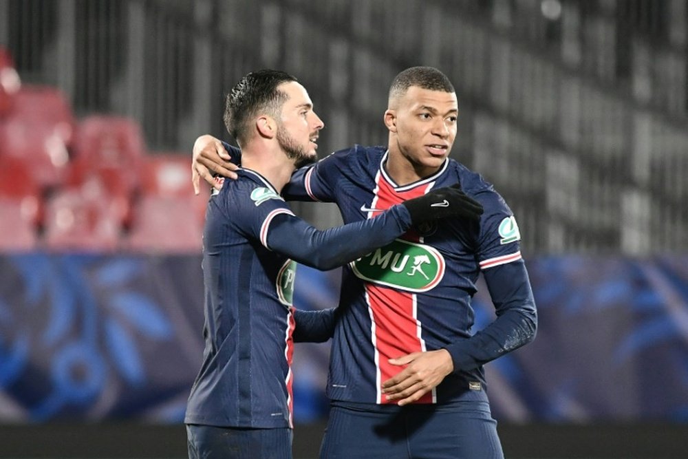 Kylian Mbappe (R) scored twice as PSG won 0-3 at Brest. AFP