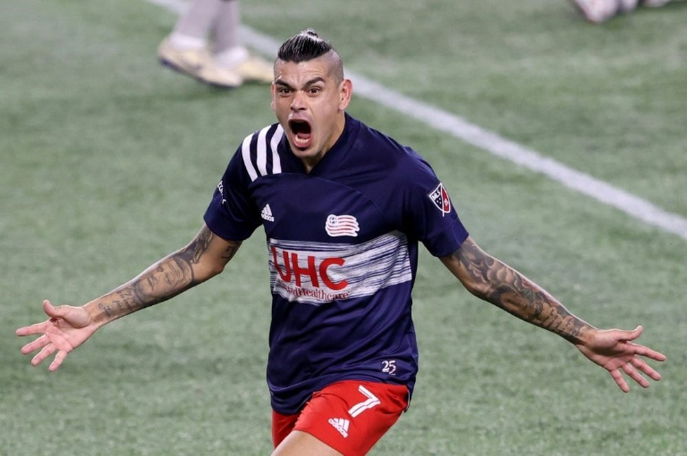 Revolution oust 10-man Orlando, face Crew in MLS semi-finals. AFP