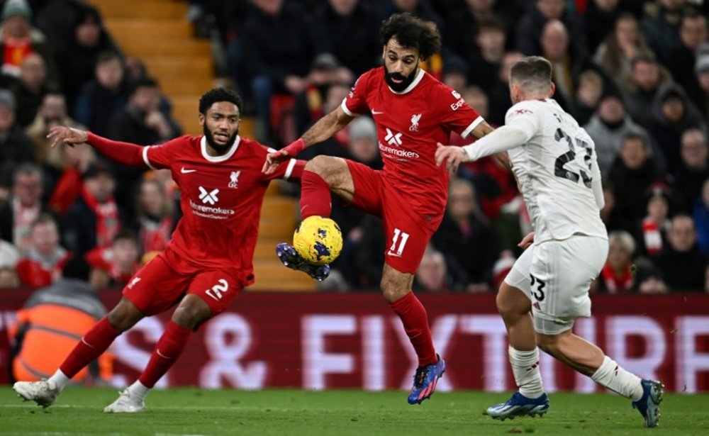 Mohamed Salah (C) could start for Liverpool against Manchester United. AFP