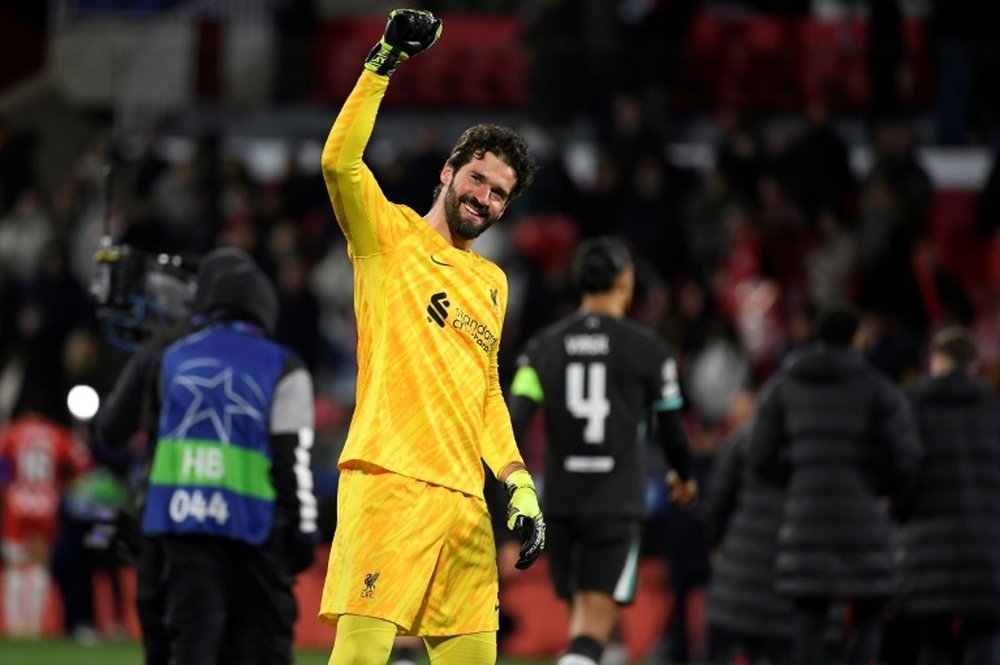 Liverpool goalkeeper Alisson said Slot's men deserve to be ranked on their own terms. AFP