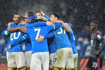 Napoli's players celebrate after beating Leicester. AFP