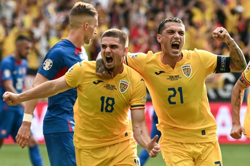 Romania finished top having scored more goals than second-placed Belgium. AFP