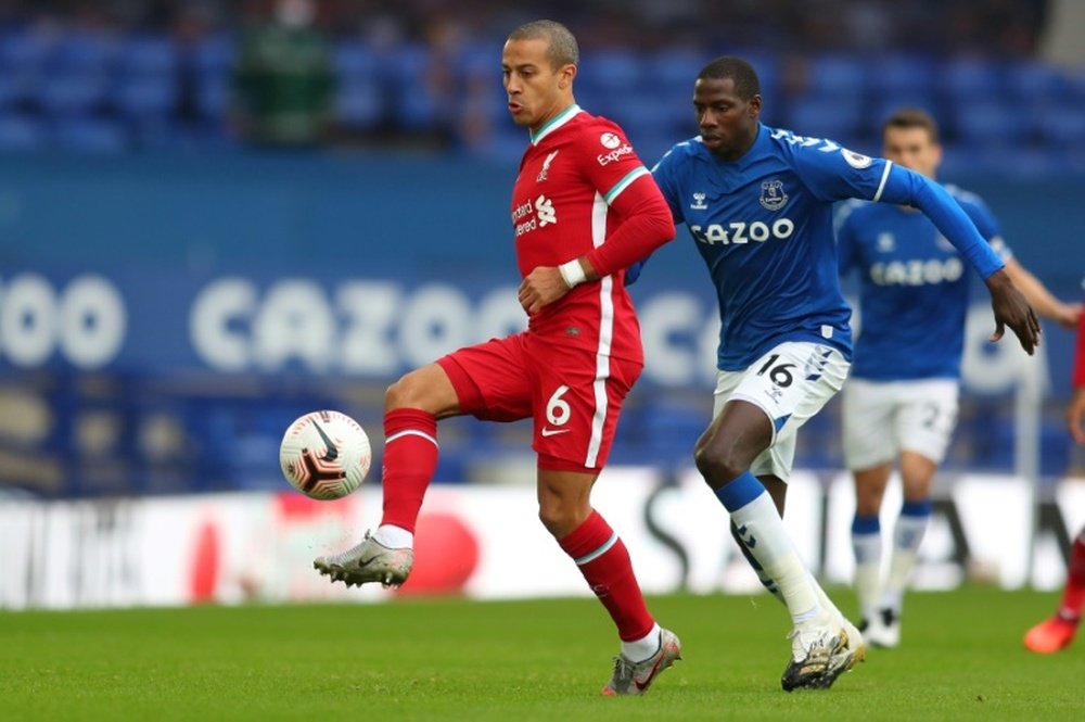 Thiago Alcantara (L) is not yet ready to return to action for Liverpool. AFP