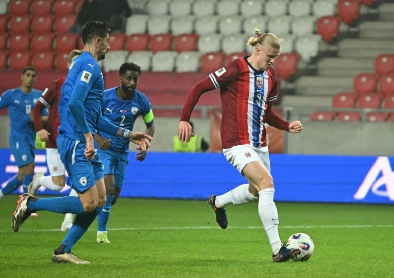 Wales handed North Macedonia an added-time present but then clawed back a scrappy equaliser as time expired to draw 1-1 in World Cup qualifying on Tuesday.