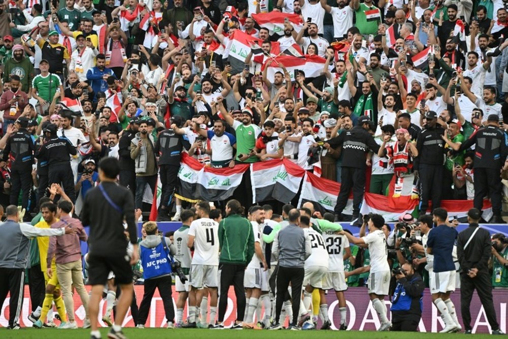 Most in a crowd of nearly 40,000 were behind Iraq in their shock 2-1 win over Japan. AFP