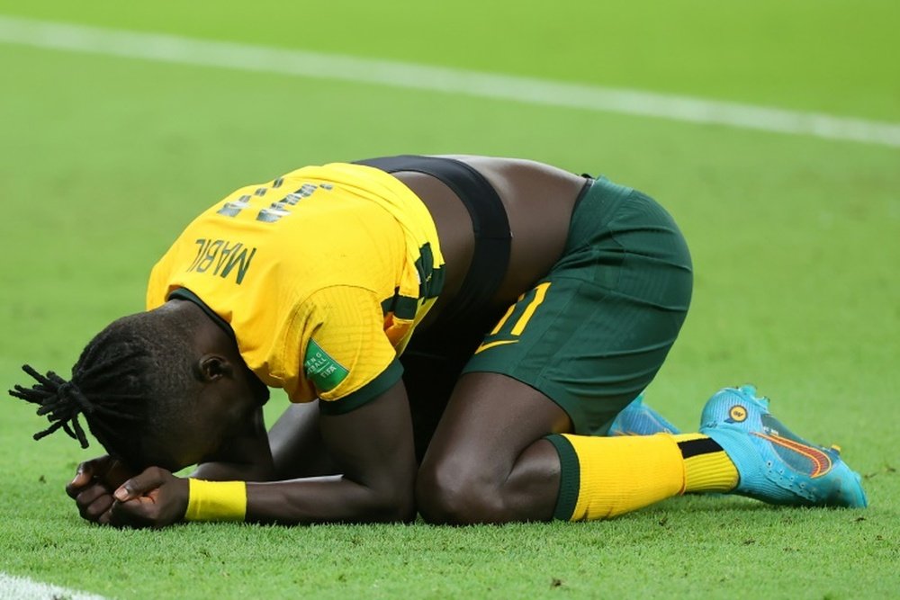 Awer Mabil was emotional after making the World Cup with Australia. AFP