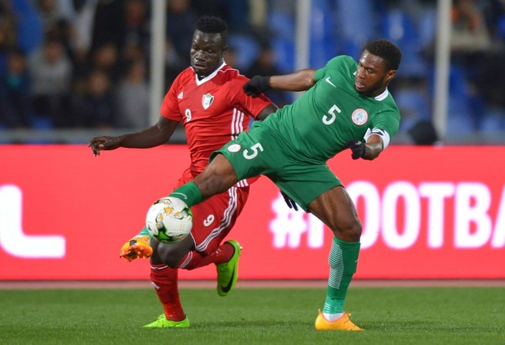 Saifeldin Bakhit (L) playing for Sudan against Nigeria. AFP