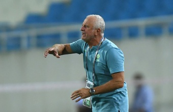 Australia coach Graham Arnold will miss the World Cup qualifier with Vietnam. AFP