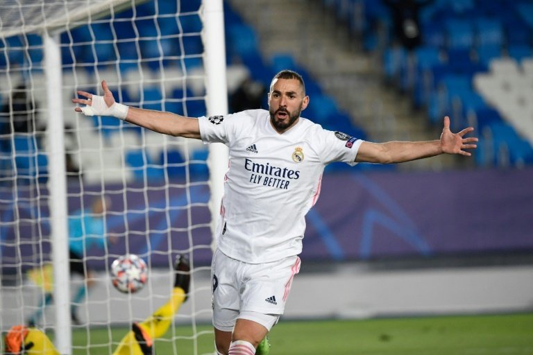 Karim Benzemas brace sent record 13-time winners Real Madrid through. AFP