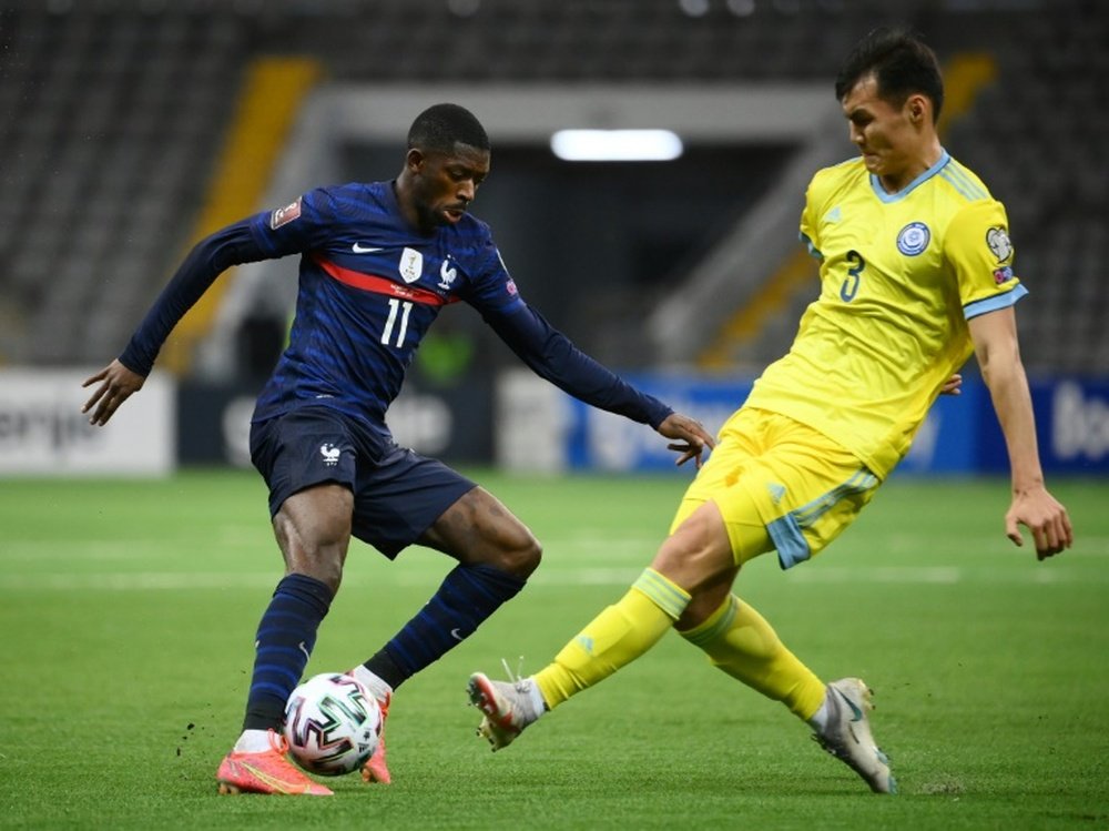 Dembele (L) scored as France beat Kazakhstan 0-2. AFP