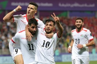 Palestine reached the Asian Cup knockout rounds for the first time after beating Hong Kong 3-0 on Tuesday for their maiden win in the history of the competition.