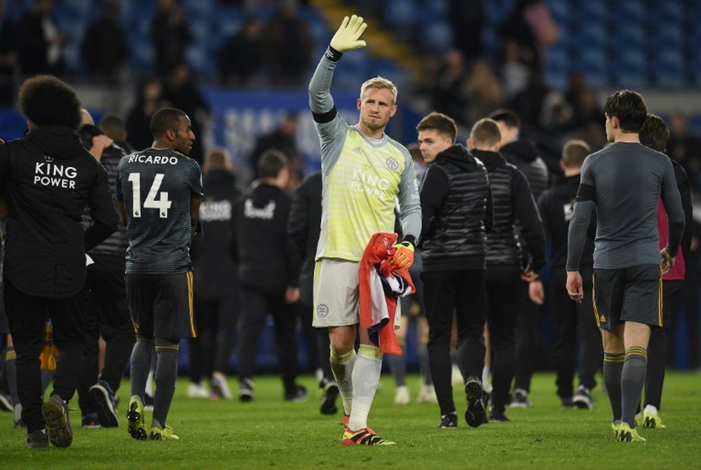 Leicester's Kasper Schmeichel applauds fans after his side's emotional win at Cardiff. AFP