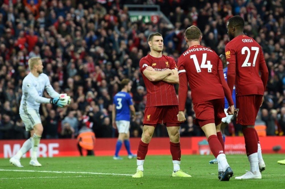 Late penalty helps Liverpool see off Leicester to stretch lead. AFP