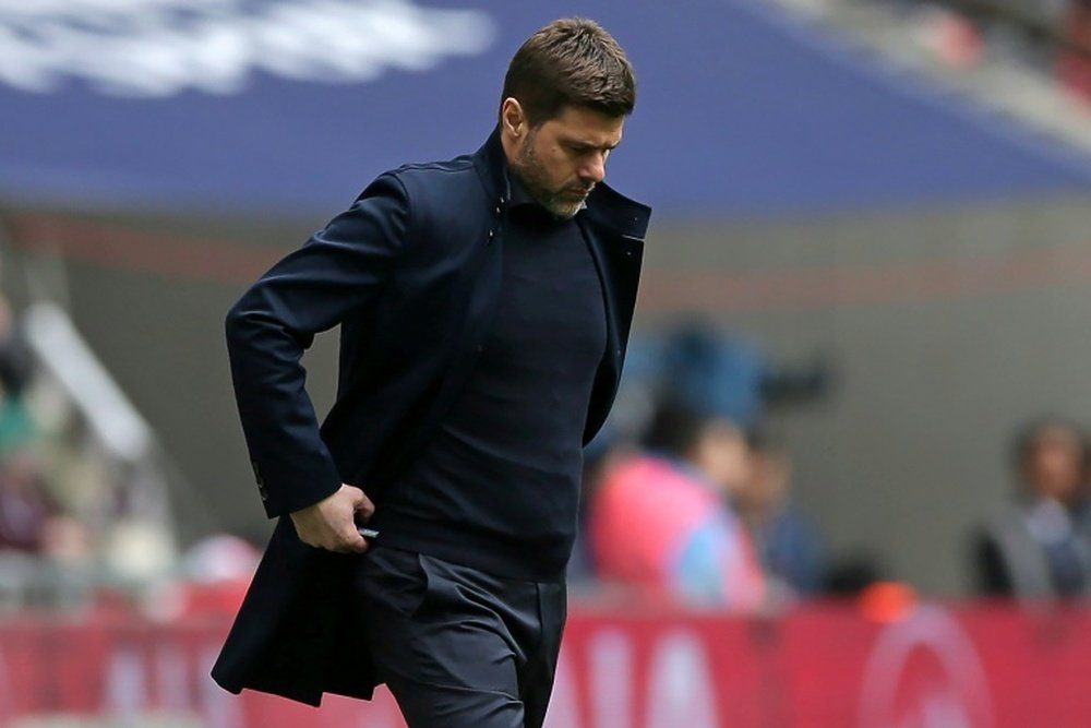 Pochettino has seen his Spurs side lose their form. AFP