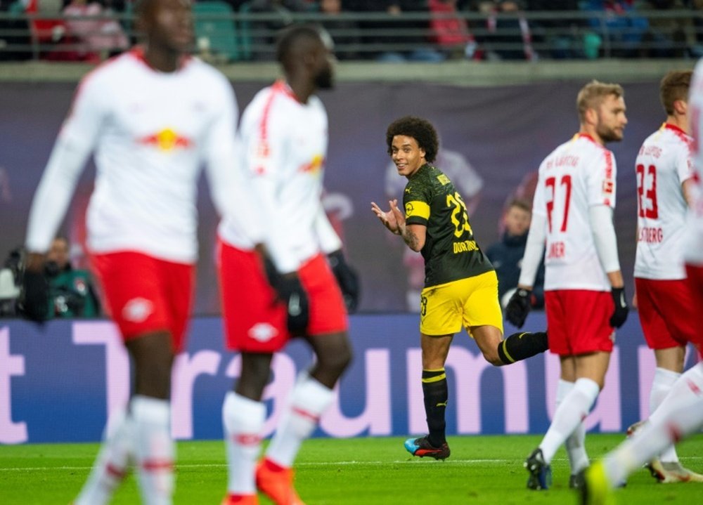 Witsel winner keeps Dortmund six points clear in Bundesliga.