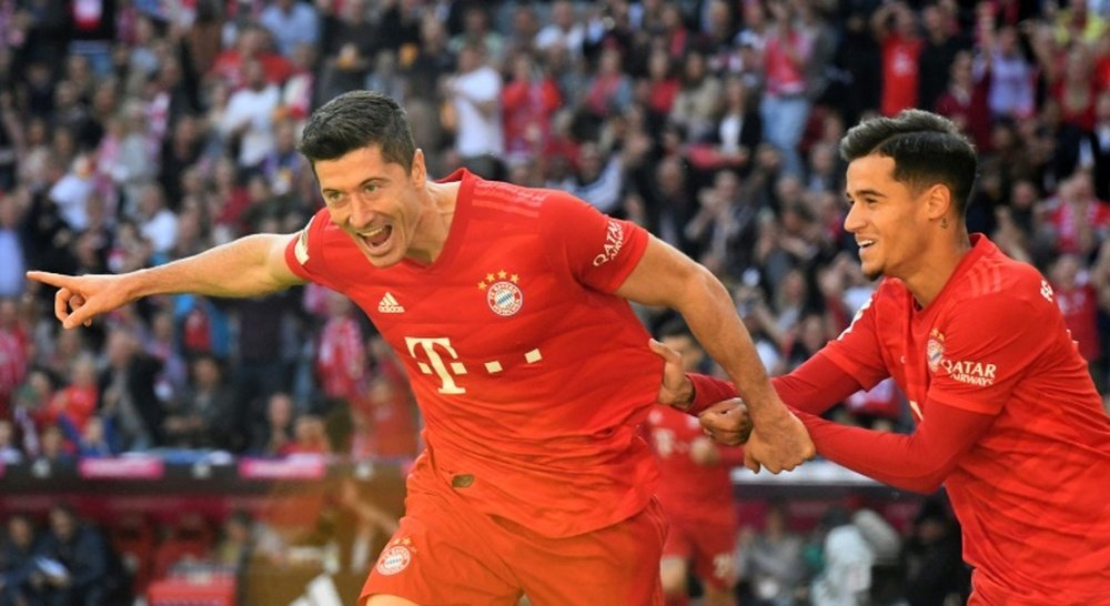 Coutinho and Lewandowski fire Bayern top with Cologne rout. AFP
