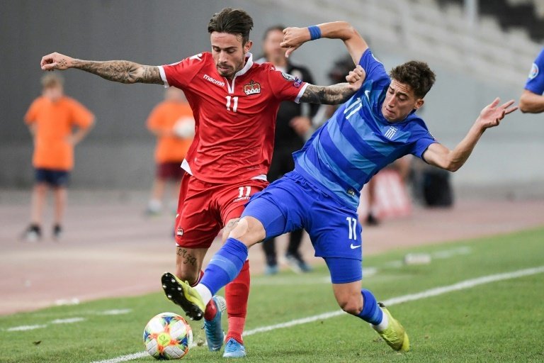 Liverpool sign Olympiakos defender Tsimikas