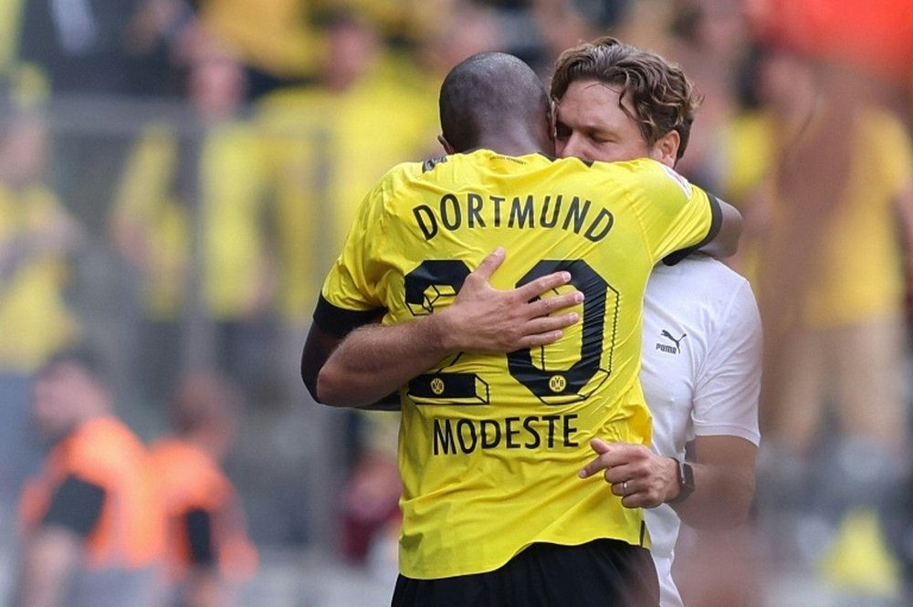 Modeste embraced Terzic after scoring. AFP