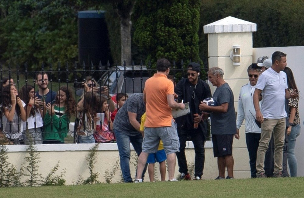 Neymar arrives at Brazil camp. AFP