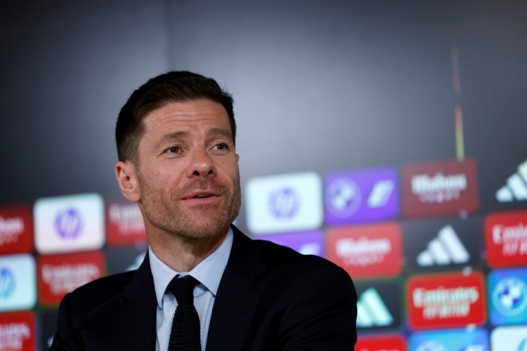Xabi Alonso spoke to the media after signing his contract with Los Blancos. AFP