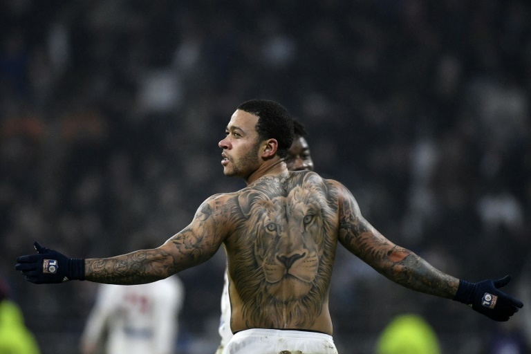 Soccrates Images  Memphis Depay of Holland Tattoo Lion