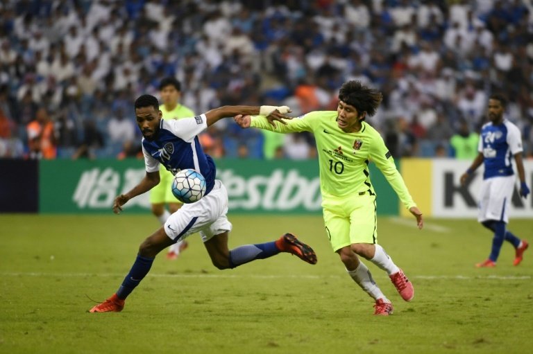 Japan's Reds target Asian glory after race row. AFP