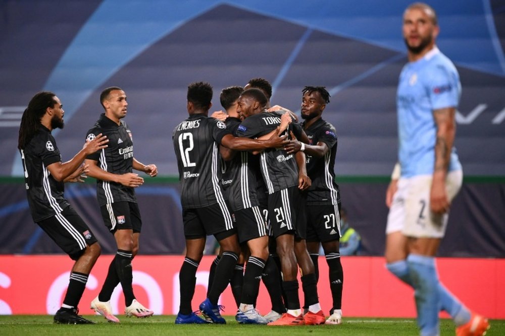 Moussa Dembele scored twice Lyon beat Man City to reach the Champions League semis. AFP