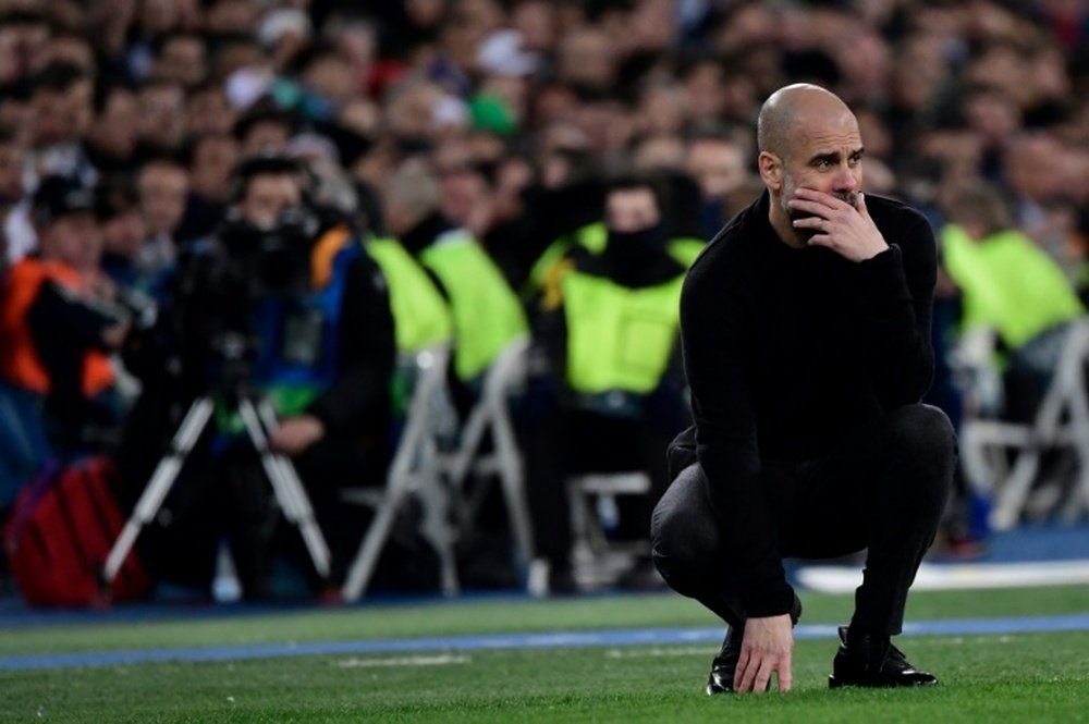 Pep Guardiola is pleased, but not overconfident. AFP