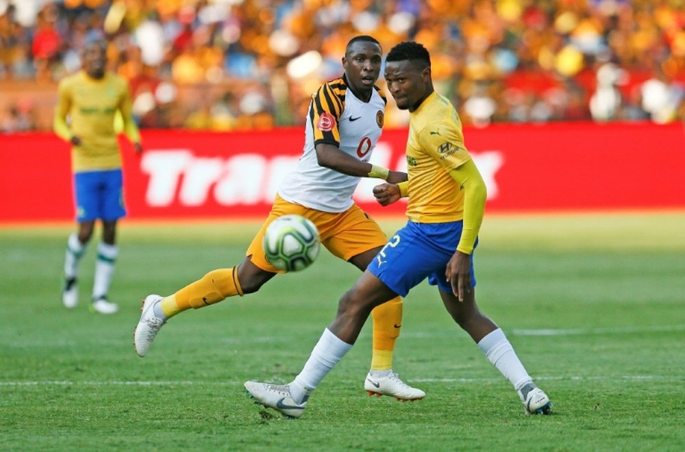 Motjeka Madisha (R) playing for Mamelodi Sundowns against Kaizer Chiefs in Pretoria last year. AFP
