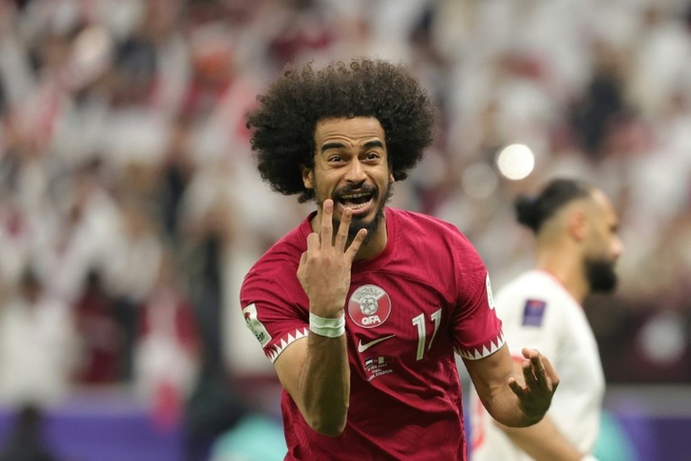 Qatar become the fifth team to lift back-to-back Asian titles. AFP