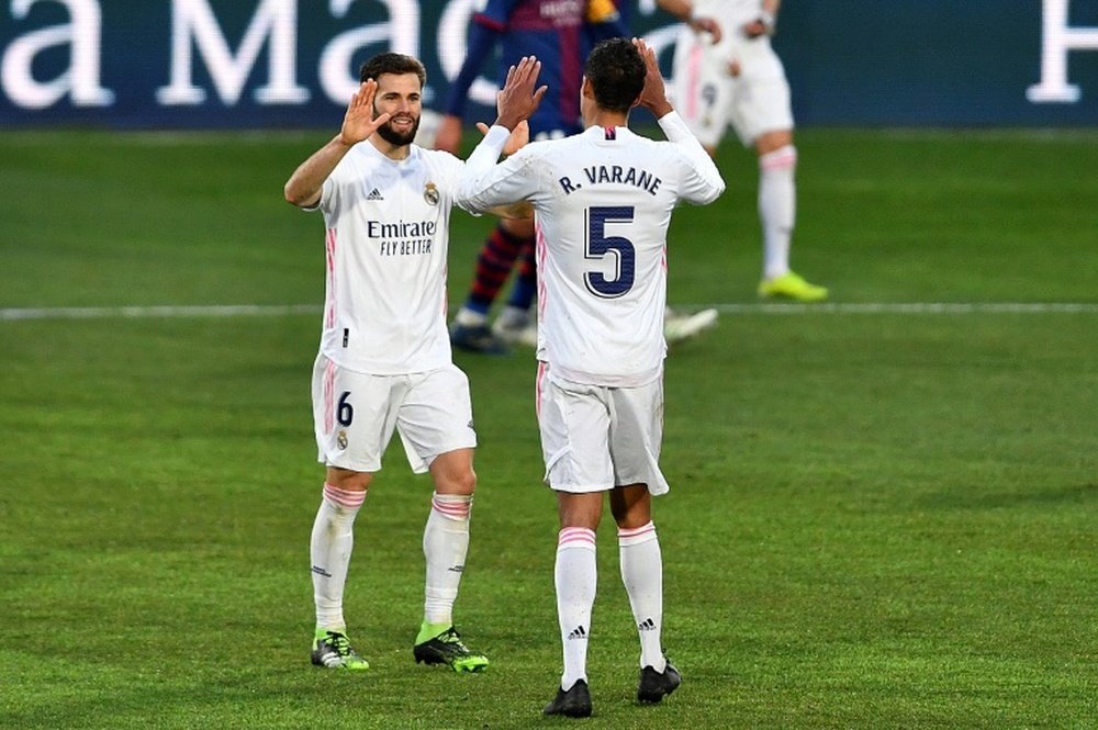 Gutsy Real Madrid come from behind to beat struggling Huesca. AFP