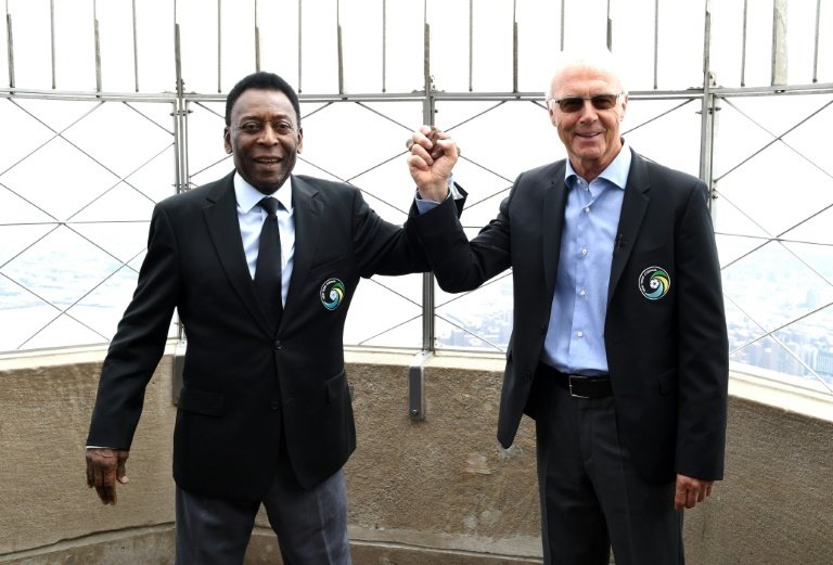 Pele and Franz Beckenbauer raised interest in soccer in the United States by joining NY Cosmos. AFP