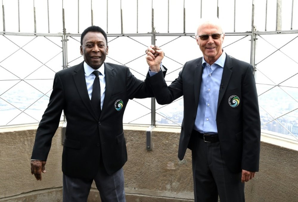 Pele and Beckenbauer raised interest in soccer in the United States by joining the NY Cosmos. AFP