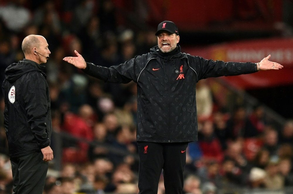 Jurgen Klopp contests a decision at Old Trafford. AFP