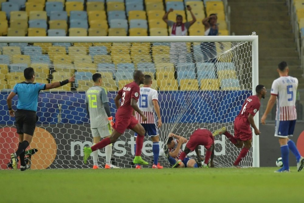 Qatar came from behind to salvage a draw against Paraguay. AFP