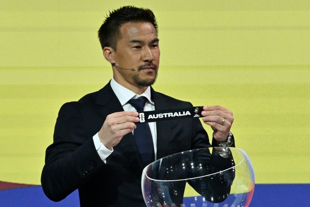 Japanese former footballer Shinji Okazaki helped conduct the draw. AFP