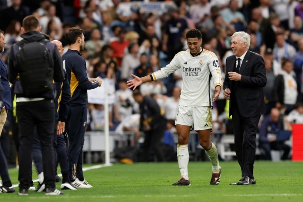 Madrids win over Cadiz sent them 14 points clear of Barca. AFP