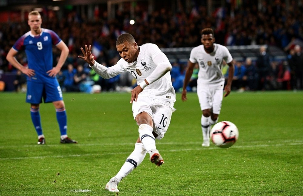 Mbappe salvaged a draw for France from the spot. AFP