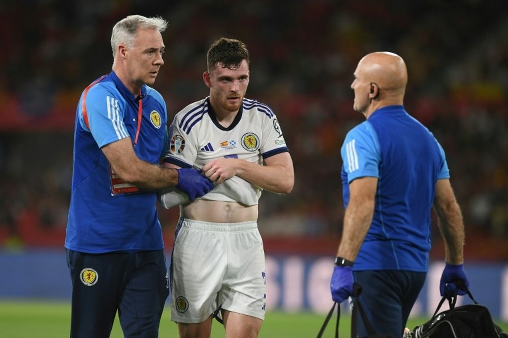 Scotland defender Andrew Robertson was injured against Spain. AFP