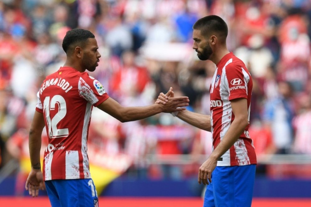 Yannick Carrasco (R) scored as Atletico beat Espanyol 2-1. AFP