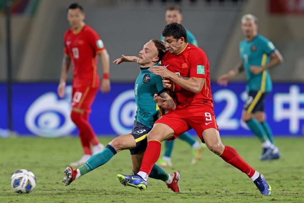 China are set to miss out on the World Cup despite an impressive draw with Australia. AFP
